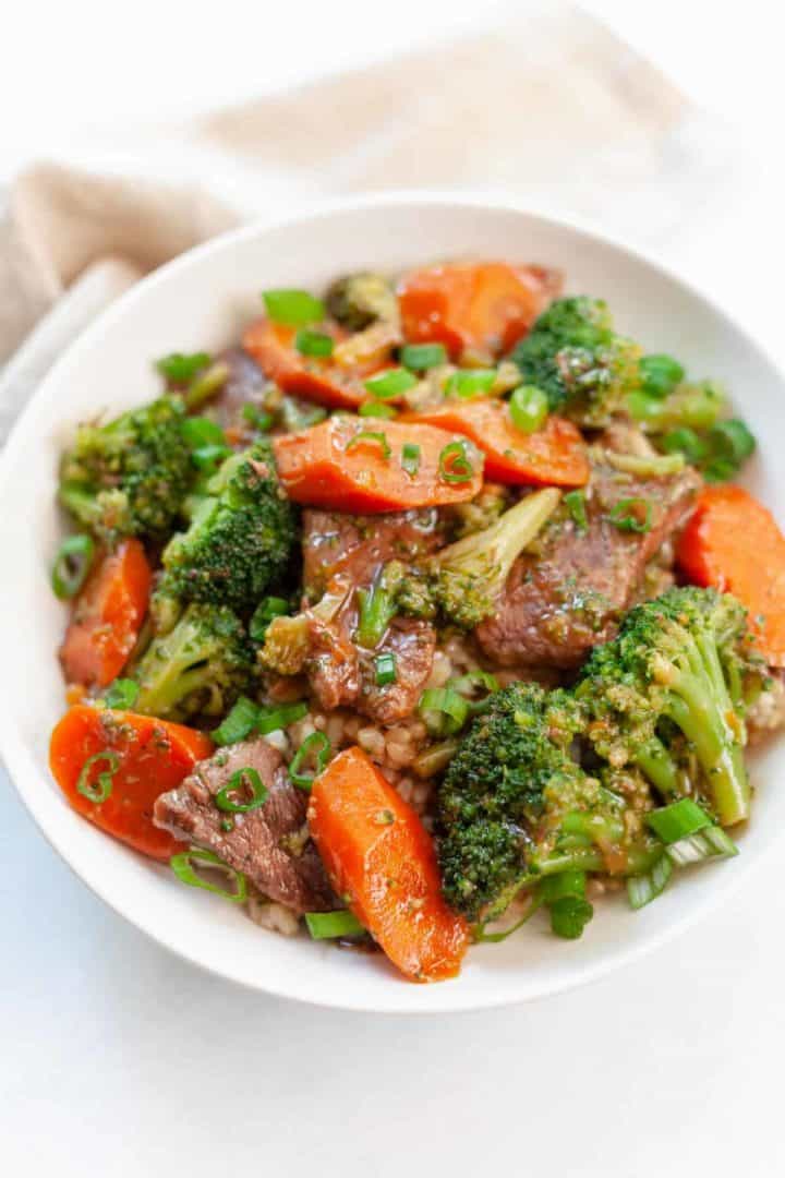 Crockpot Beef and Broccoli with carrots in a bowl