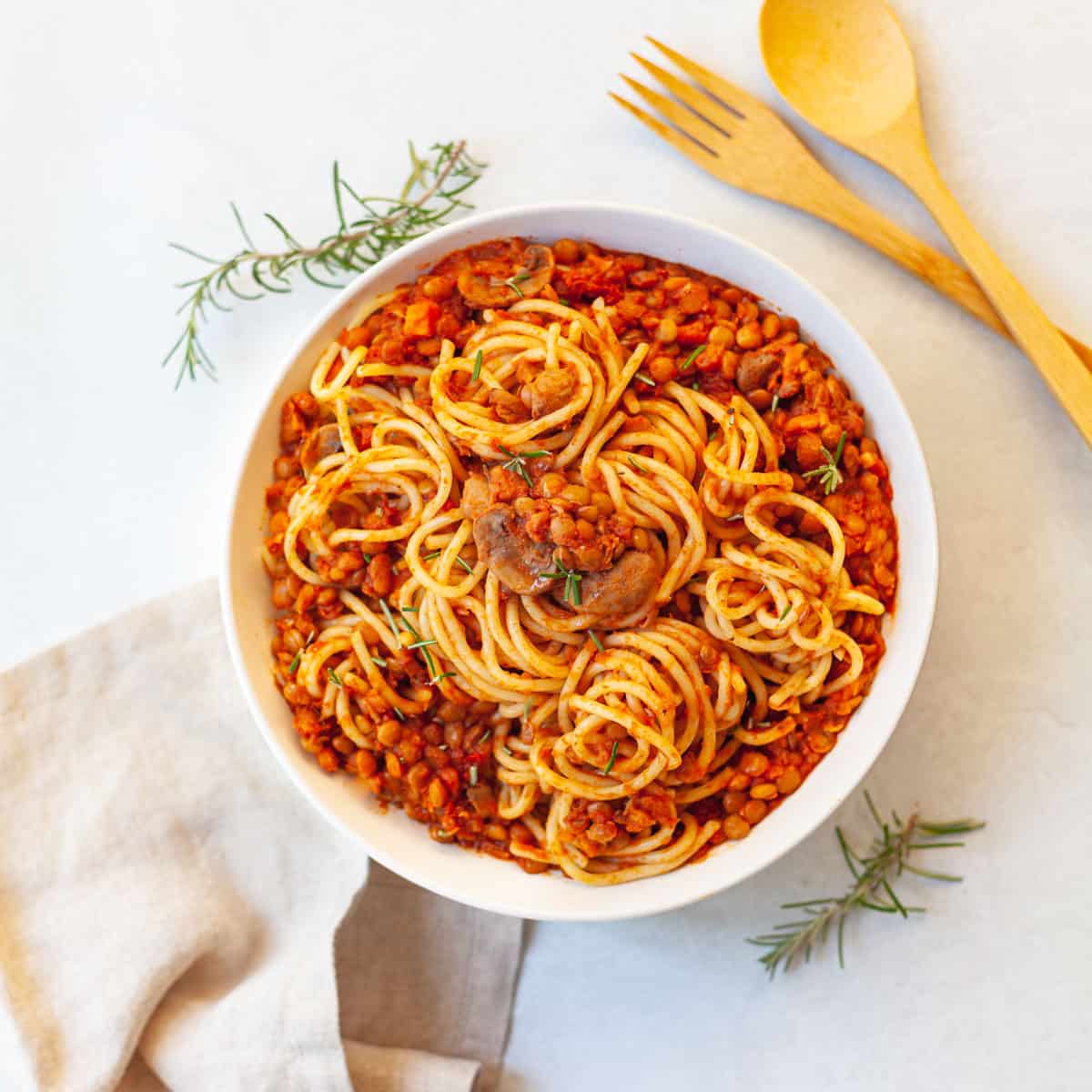 bowl of lentil bolognese pasta sauce with spaghetti noodles