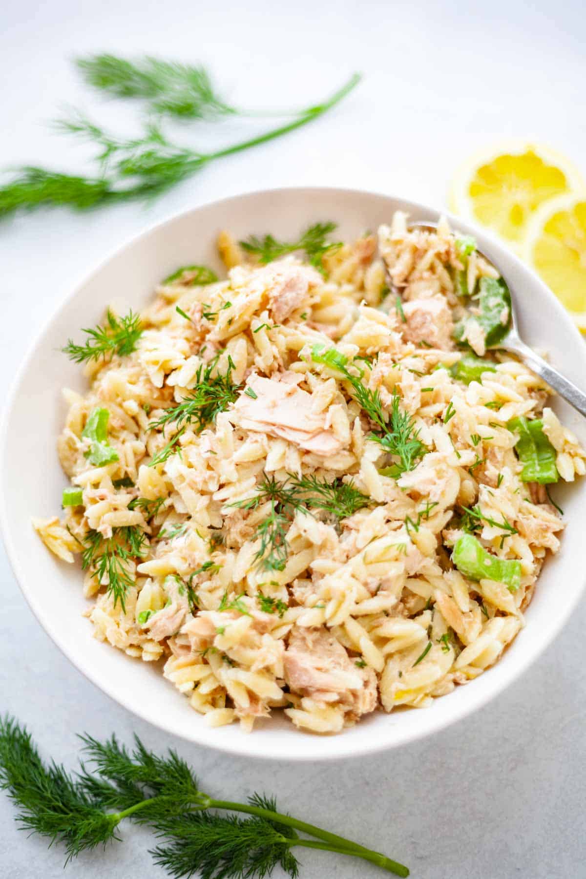 a bow of orzo and canned tuna with dill