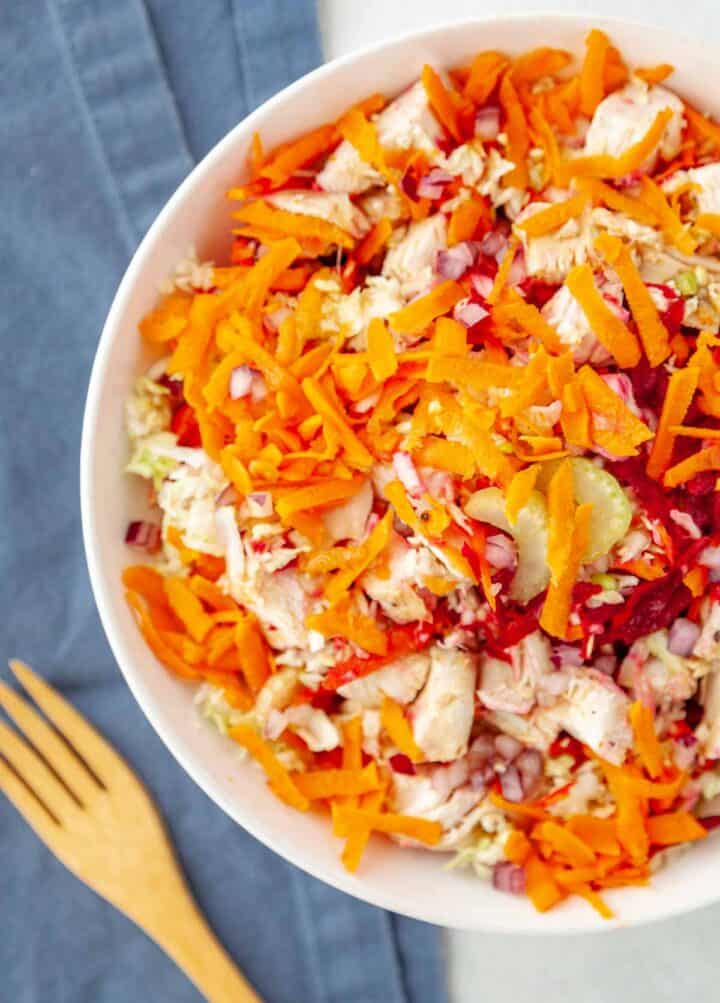 bowl of grated veggies and chicken breast