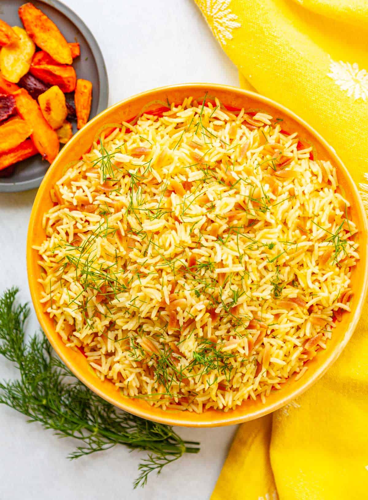 a bowl of cooked orzo and basmatic rice pilaf