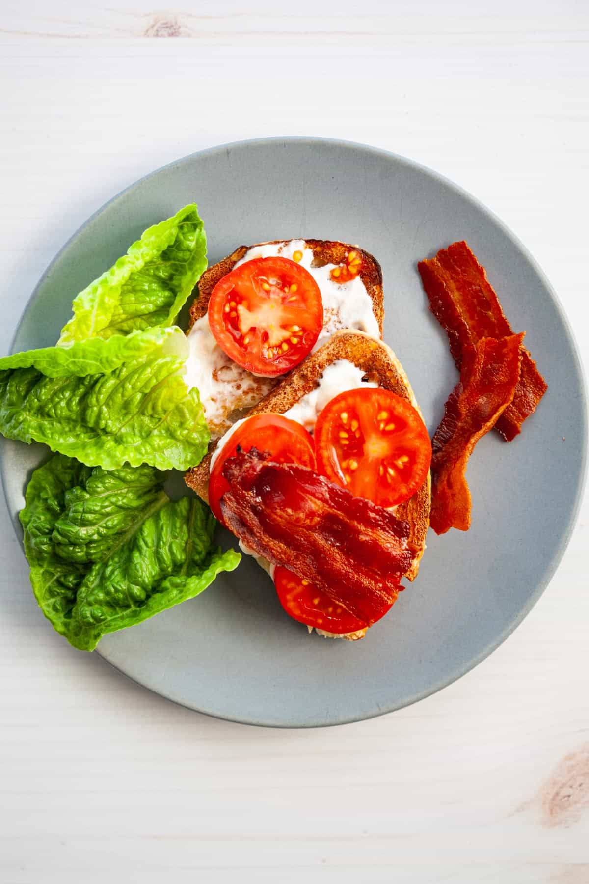bacon, lettuce and tomato and bread slices with mayonnaise
