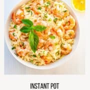 a bowl of orzo pasta and shrimp
