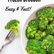 a bowl of cooked broccoli and a fork spearing a broccoli floret