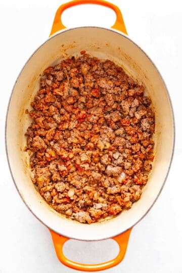 Ground beef mixed with tomato paste.