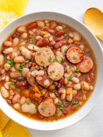 Bean soup with slices of sausage.