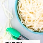 A bowl of cooked rice noodles.